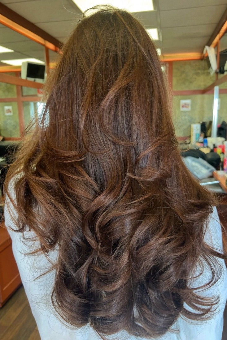 Long layers finished in loose waves