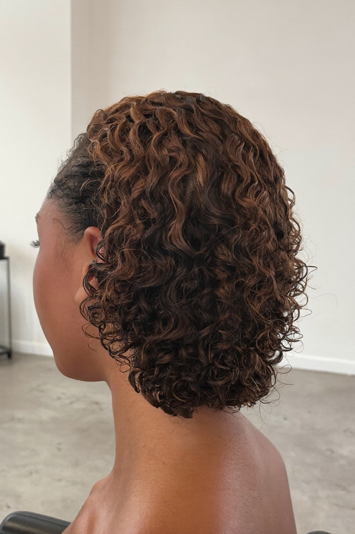 A curly cut with defined, hydrated curls